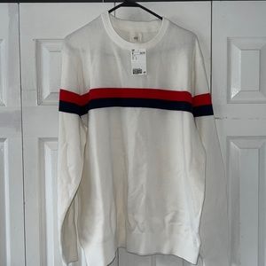 White sweater with red and blue stripes